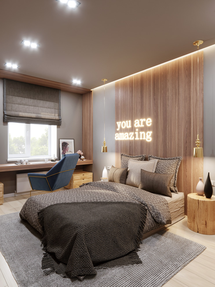 Foto di una piccola camera da letto contemporanea con pareti grigie, parquet chiaro e pavimento beige
