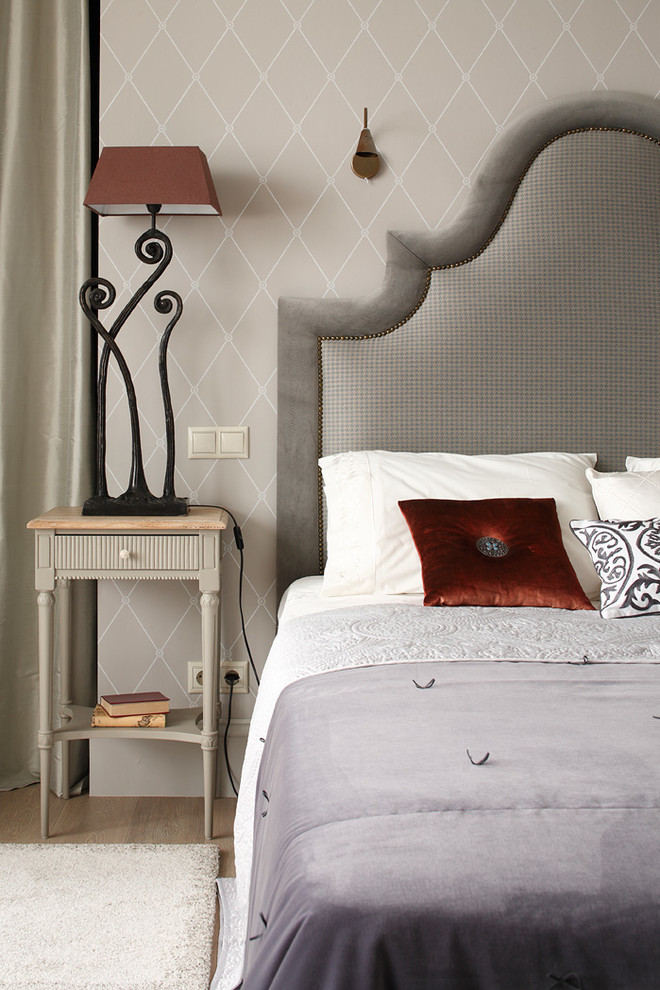Inspiration for a traditional bedroom in Moscow with grey walls.