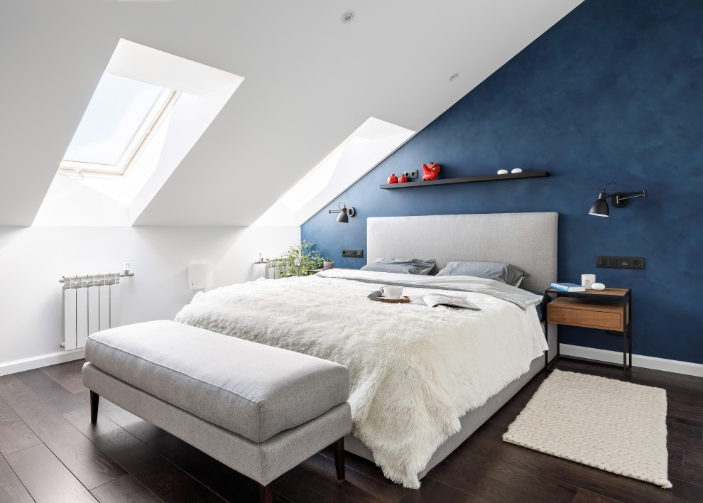 Medium sized contemporary master bedroom in Saint Petersburg with blue walls, dark hardwood flooring and brown floors.
