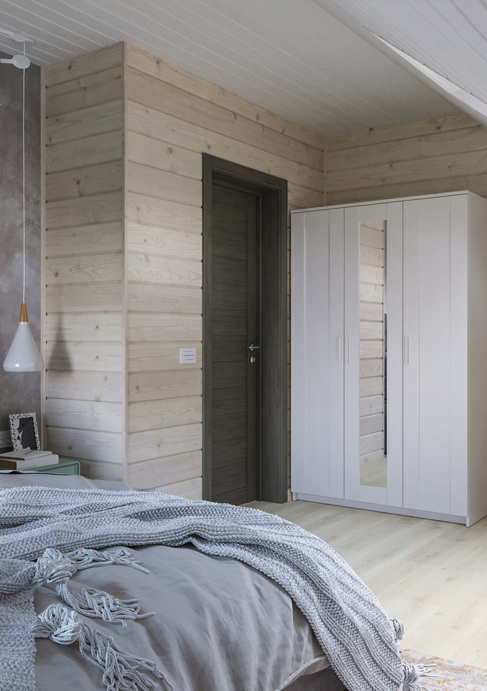 Пример оригинального дизайна: спальня среднего размера в скандинавском стиле с полом из ламината