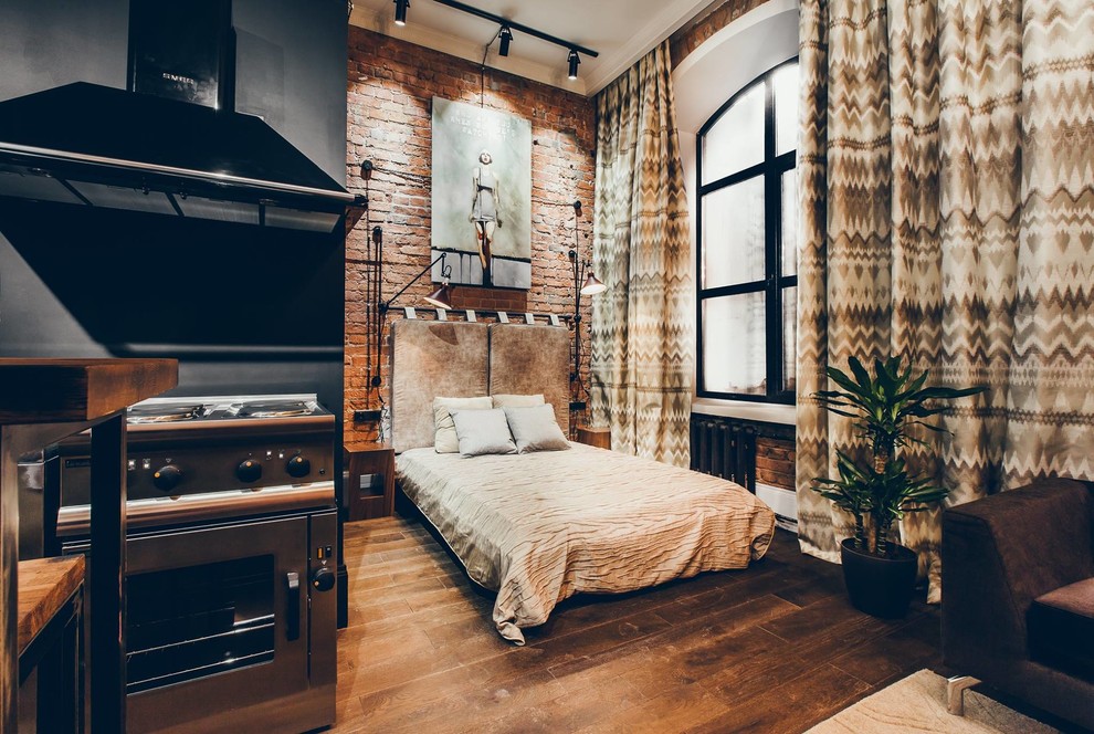 Bedroom - industrial dark wood floor and brown floor bedroom idea in Moscow with red walls
