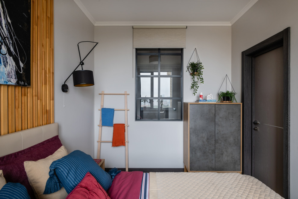Стильный дизайн: хозяйская спальня в скандинавском стиле с серыми стенами - последний тренд