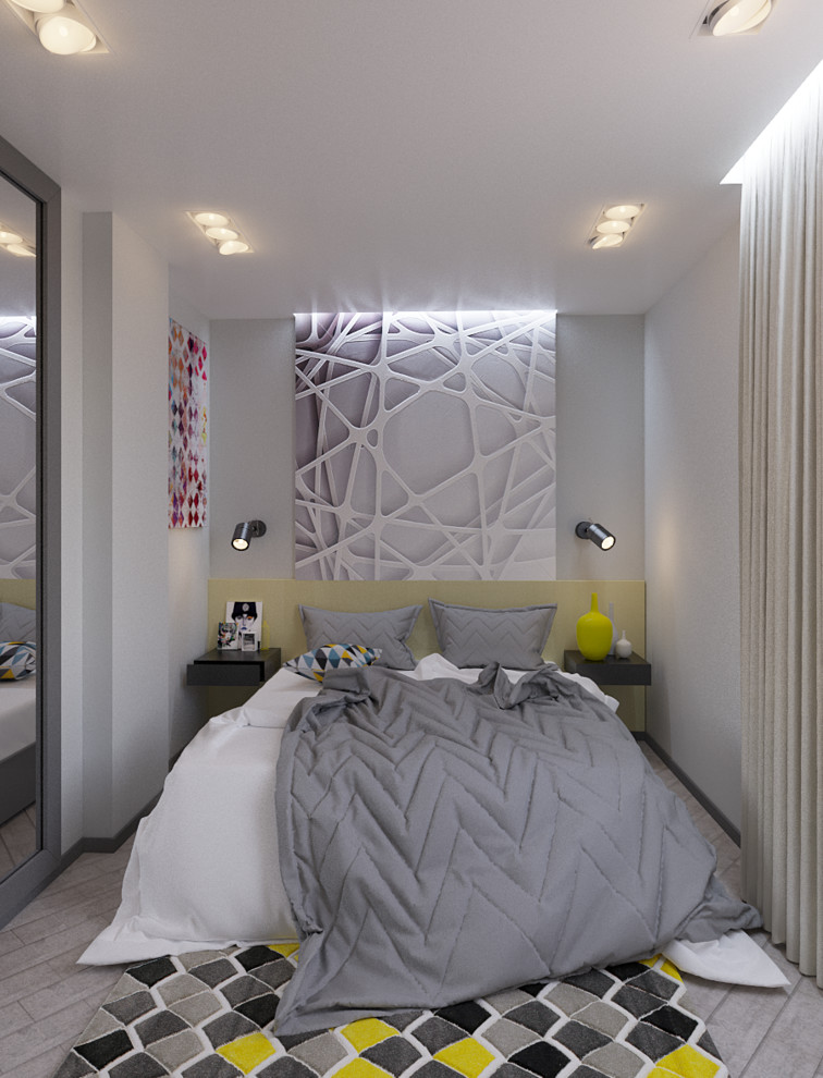 Foto di una camera matrimoniale design di medie dimensioni con pareti bianche e parquet chiaro