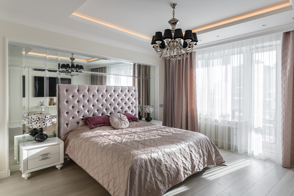Design ideas for a medium sized classic master bedroom in Saint Petersburg with beige walls, laminate floors, no fireplace and grey floors.