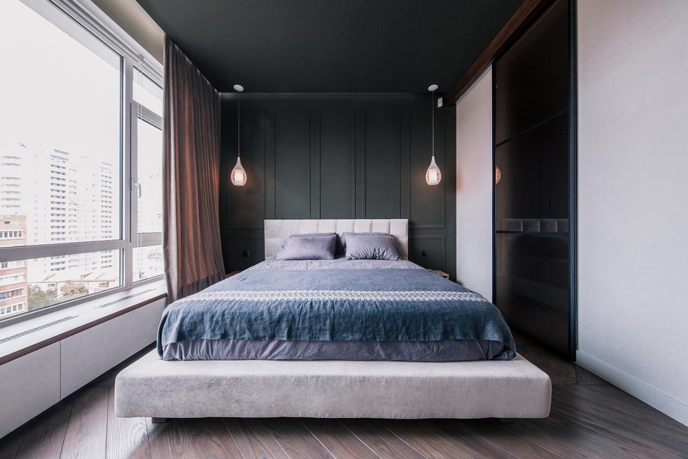 Inspiration for a small contemporary master dark wood floor and brown floor bedroom remodel with white walls