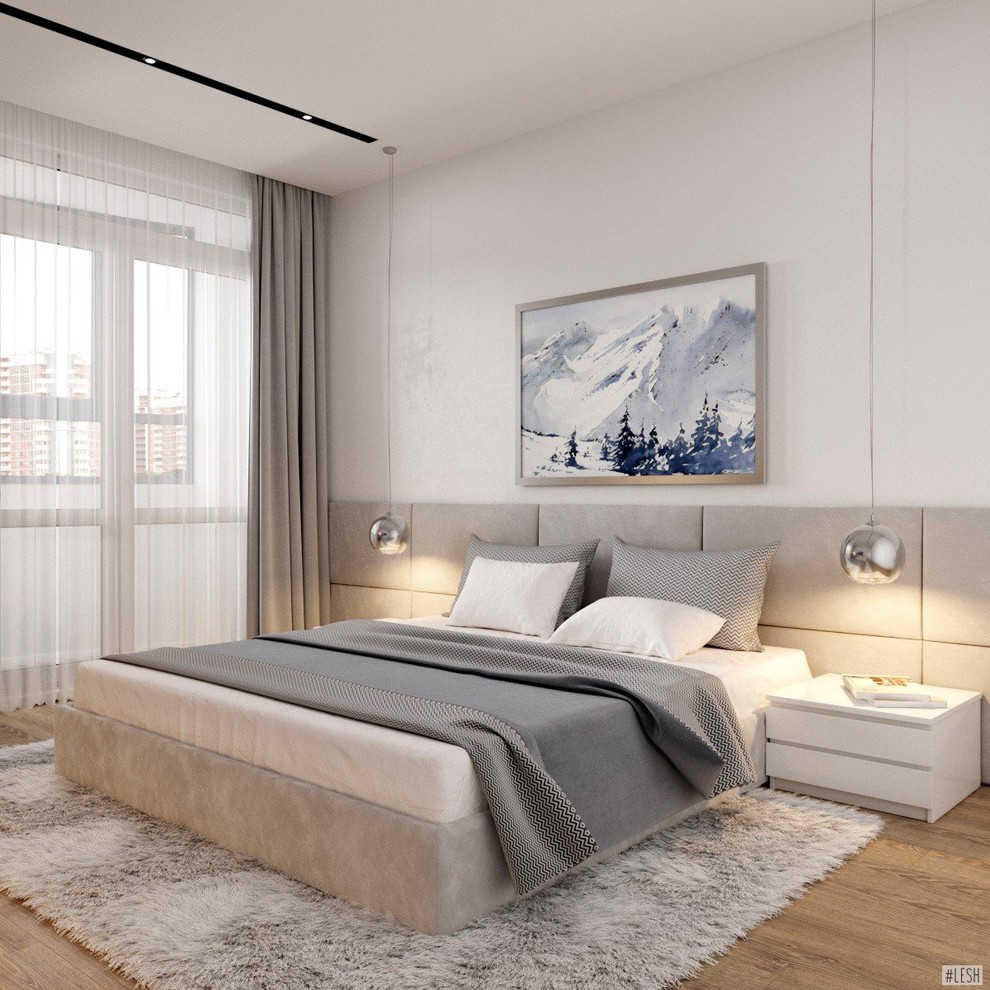 Medium sized contemporary master bedroom in Saint Petersburg with white walls, laminate floors, no fireplace and beige floors.
