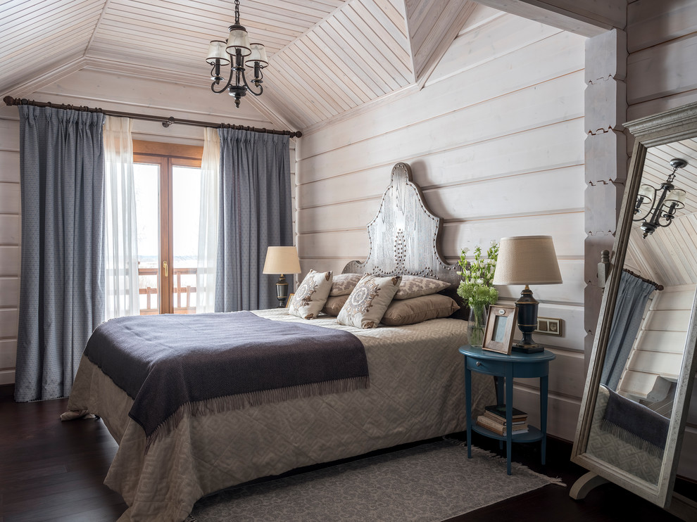 Bedroom - cottage dark wood floor and brown floor bedroom idea in Moscow