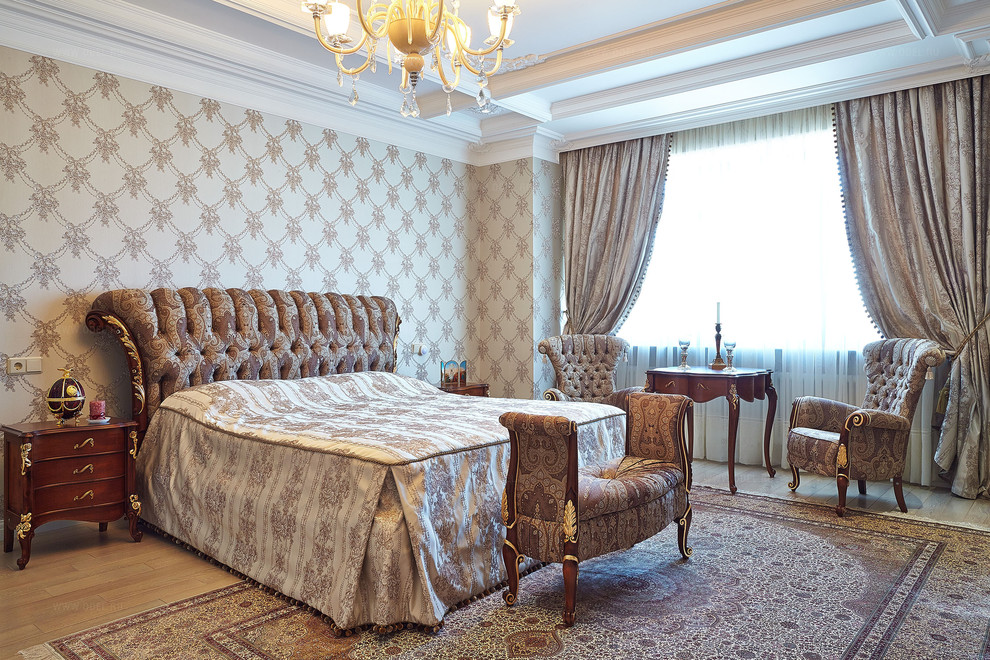 Design ideas for a large classic guest bedroom in Moscow with beige walls and light hardwood flooring.