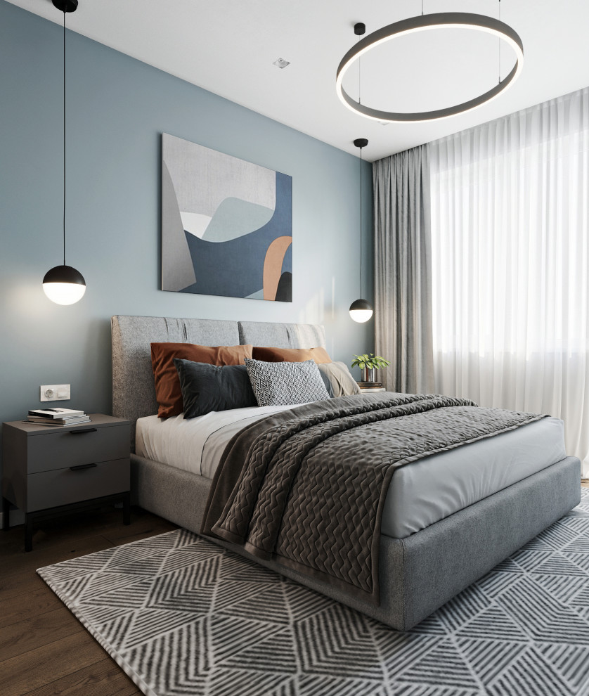 Mittelgroßes Modernes Hauptschlafzimmer mit Laminat, braunem Boden und bunten Wänden in Sonstige