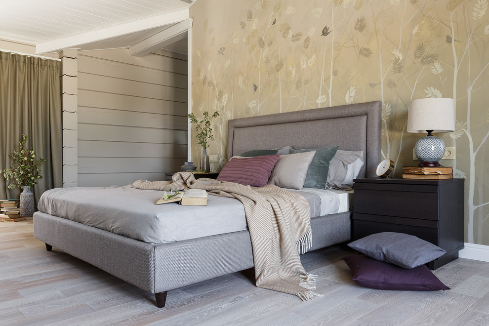 Large trendy master light wood floor and gray floor bedroom photo in Saint Petersburg with beige walls