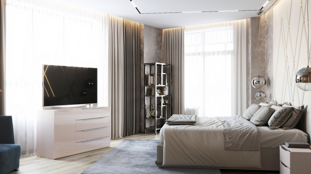 Стильный дизайн: большая хозяйская спальня в современном стиле с бежевыми стенами, полом из ламината и бежевым полом - последний тренд