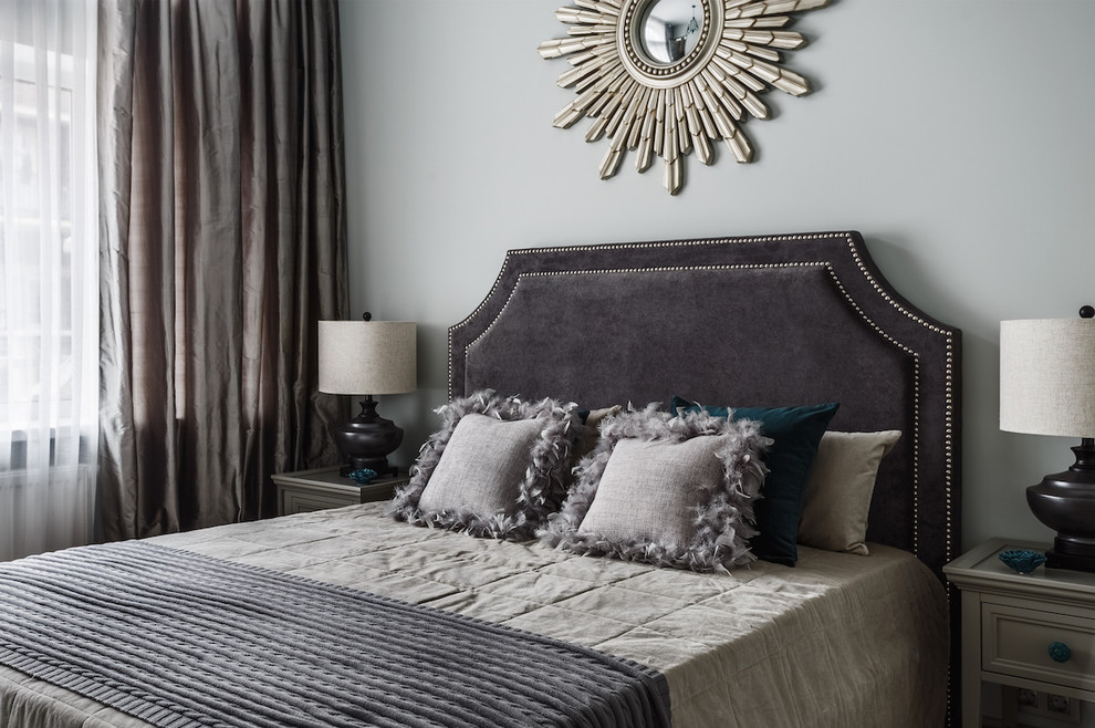This is an example of a medium sized classic guest bedroom in Moscow with grey walls.