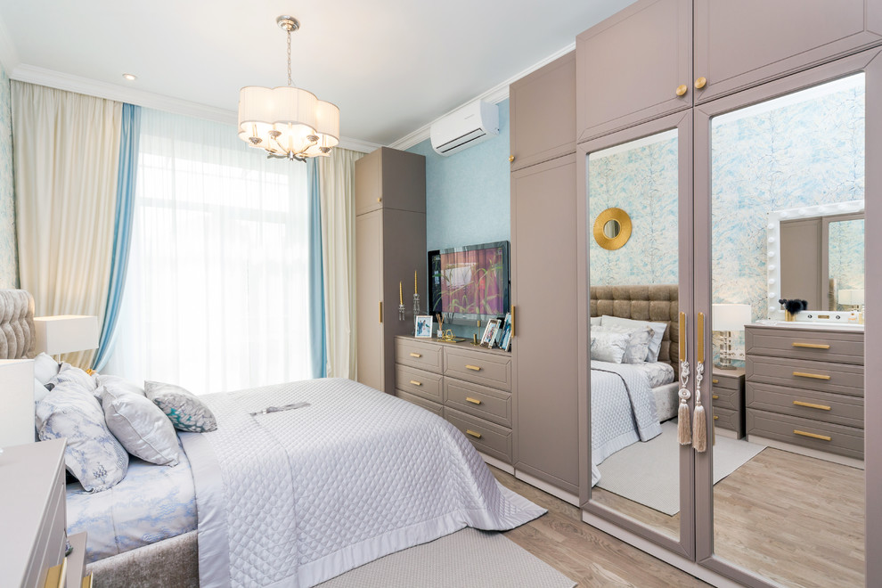 Design ideas for a small traditional master bedroom in Saint Petersburg with multi-coloured walls, medium hardwood flooring and beige floors.