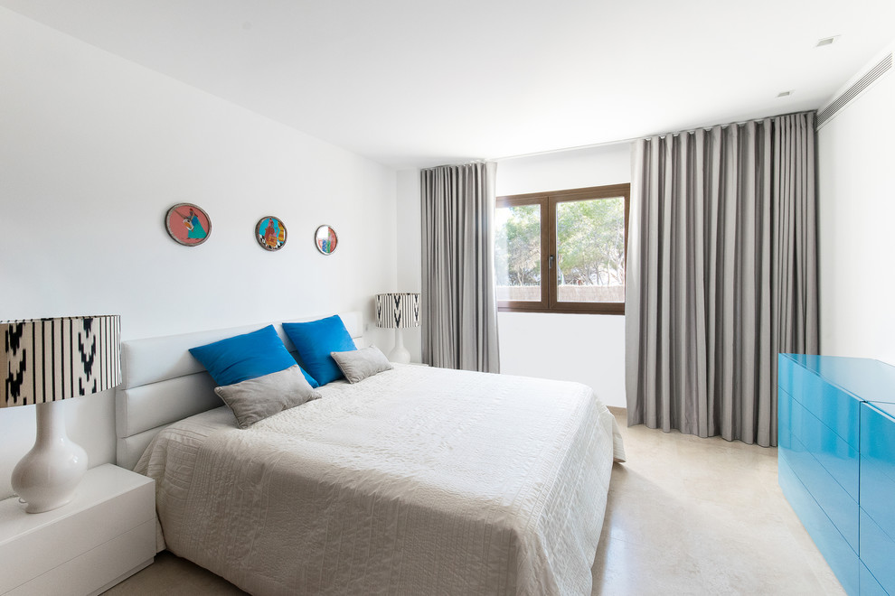 Photo of a contemporary guest bedroom in Moscow with white walls and marble flooring.