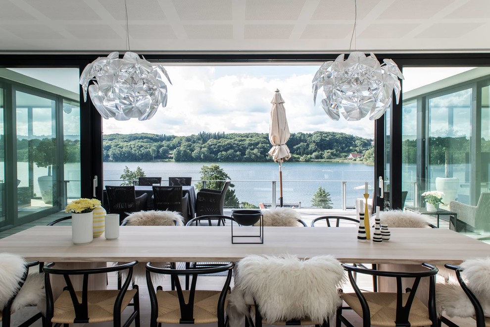 Design ideas for a medium sized modern dining room in Aarhus.