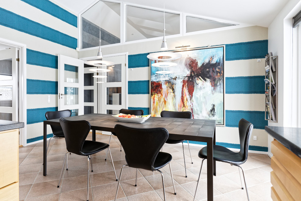 Design ideas for a contemporary dining room in Copenhagen with multi-coloured walls and beige floors.