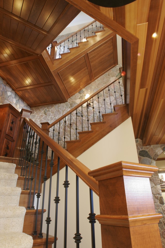 Staircase - mid-sized rustic wooden u-shaped staircase idea in Other with wooden risers