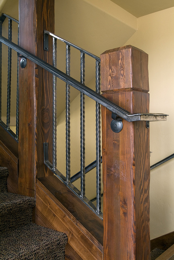 Inspiration for a rustic staircase remodel in Denver