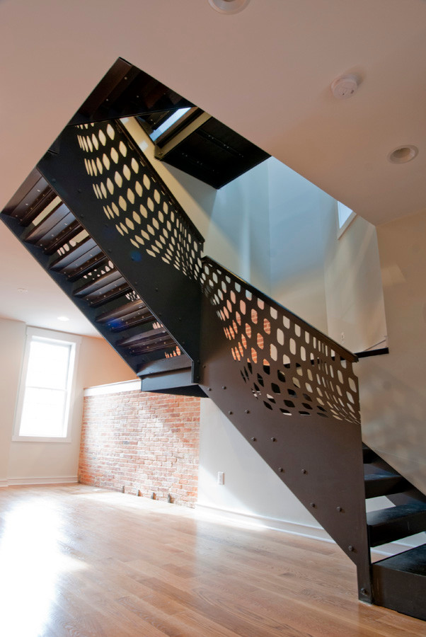 Staircase - mid-sized industrial metal l-shaped open and metal railing staircase idea in Baltimore