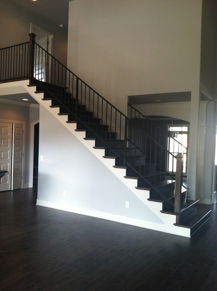 Example of a minimalist painted straight staircase design in Nashville
