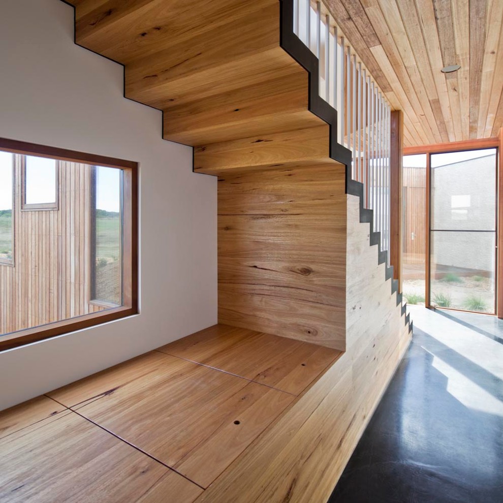 Staircase - contemporary wooden straight staircase idea in Melbourne with wooden risers