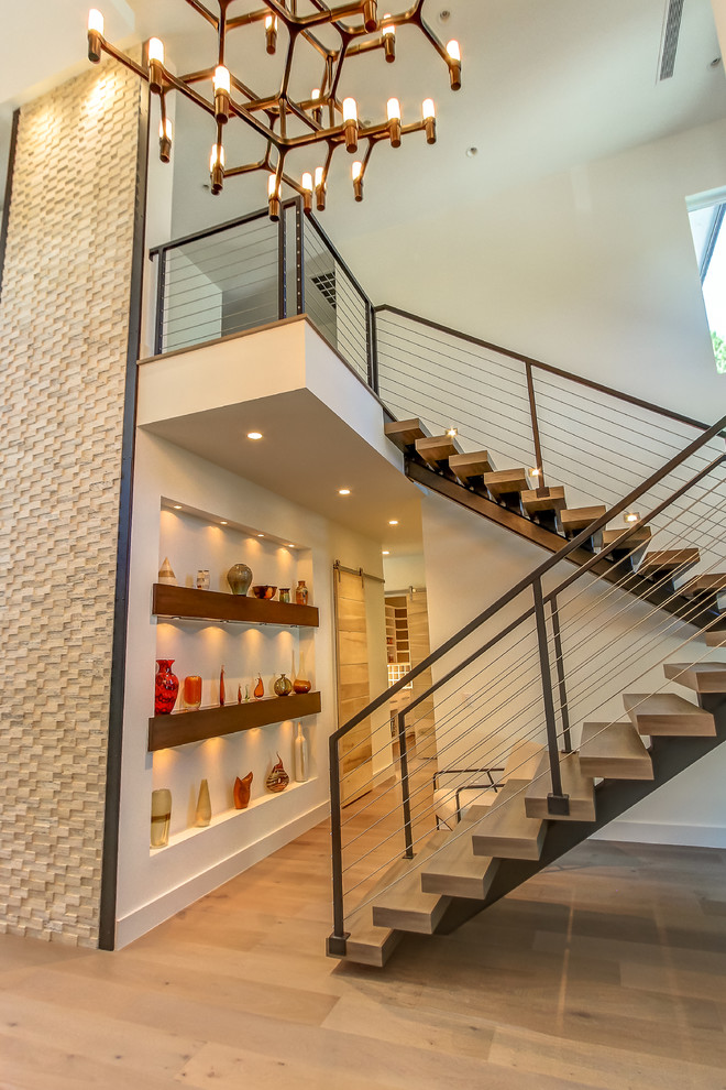 Inspiration for a mid-sized contemporary wooden floating open and cable railing staircase remodel in Atlanta