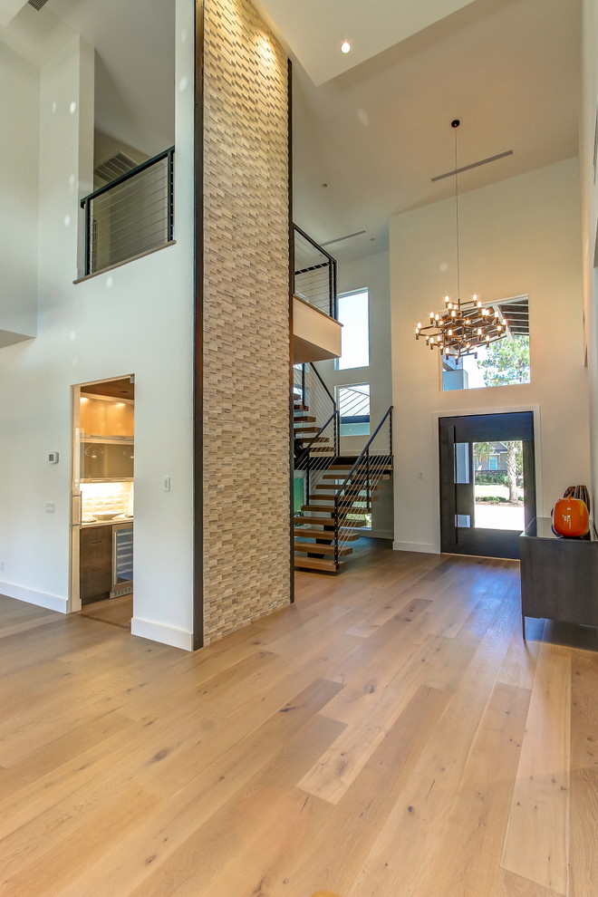 Inspiration for a mid-sized contemporary wooden floating open and cable railing staircase remodel in Atlanta