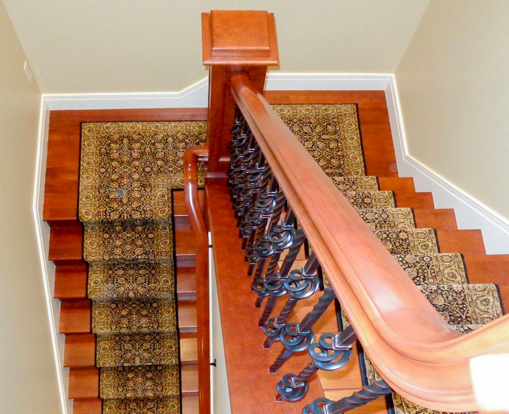 Inspiration for a mid-sized timeless wooden floating mixed material railing staircase remodel in DC Metro with wooden risers