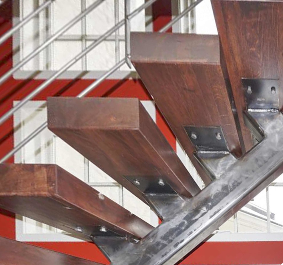 Inspiration pour un petit escalier droit urbain avec des marches en bois et un garde-corps en matériaux mixtes.