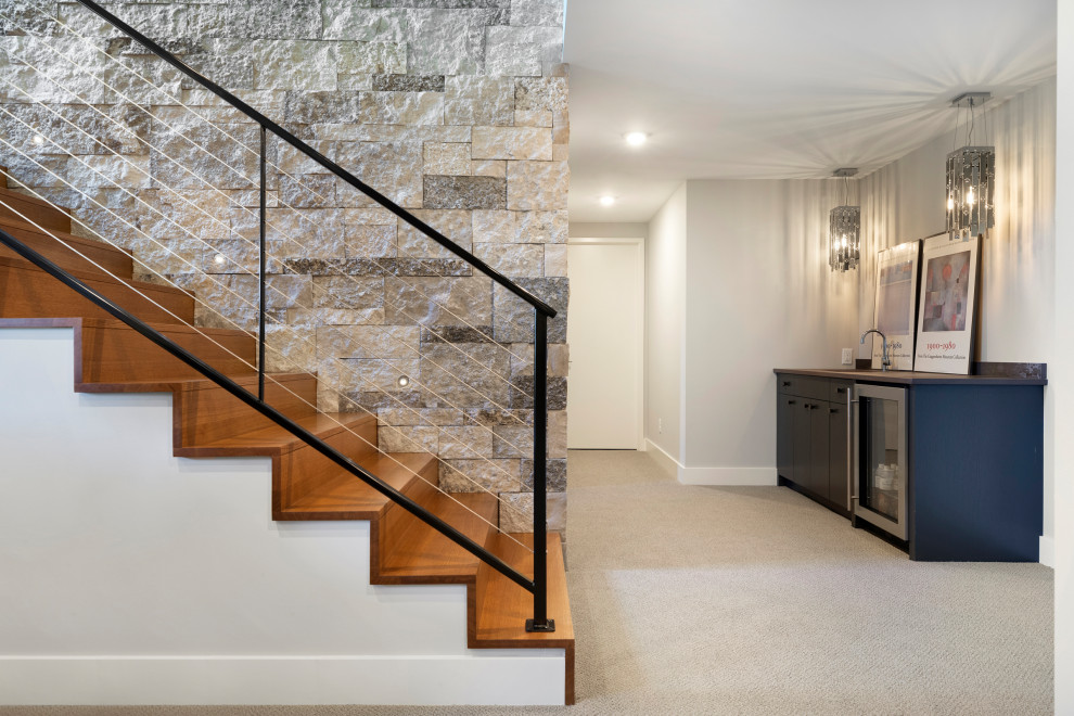 Staircase - contemporary wooden straight mixed material railing staircase idea in Minneapolis with wooden risers