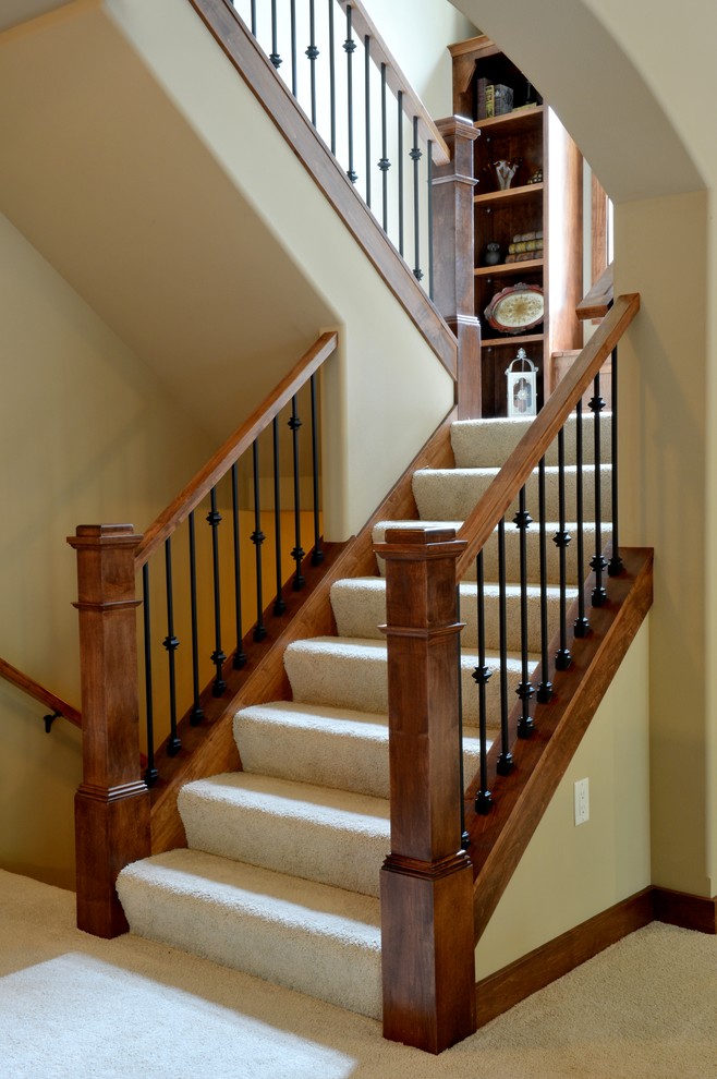 Example of an arts and crafts staircase design in Milwaukee