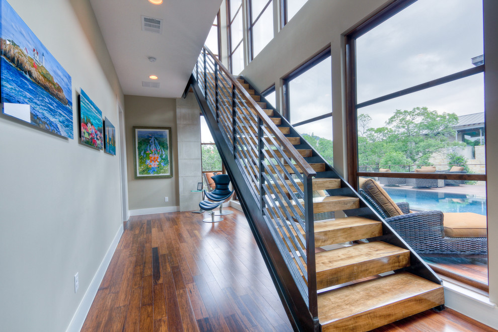 Photo of a contemporary staircase in Austin with open risers.