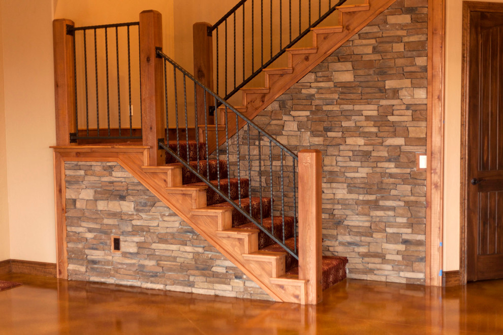 Design ideas for a medium sized rustic wood u-shaped staircase in Oklahoma City with wood risers.