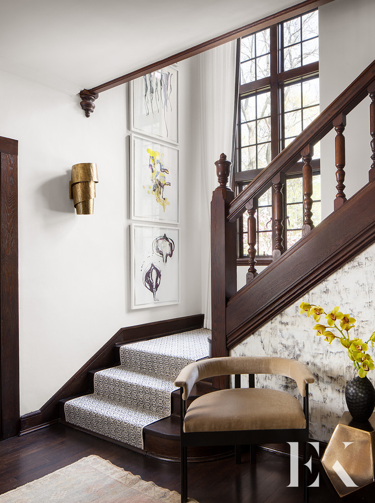 Inspiration for a mid-sized eclectic wooden l-shaped wood railing staircase remodel in Chicago with wooden risers