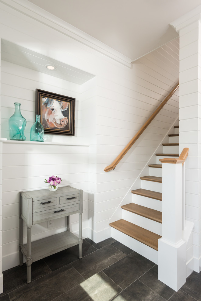 Mid-sized farmhouse wooden straight staircase photo in New York with painted risers