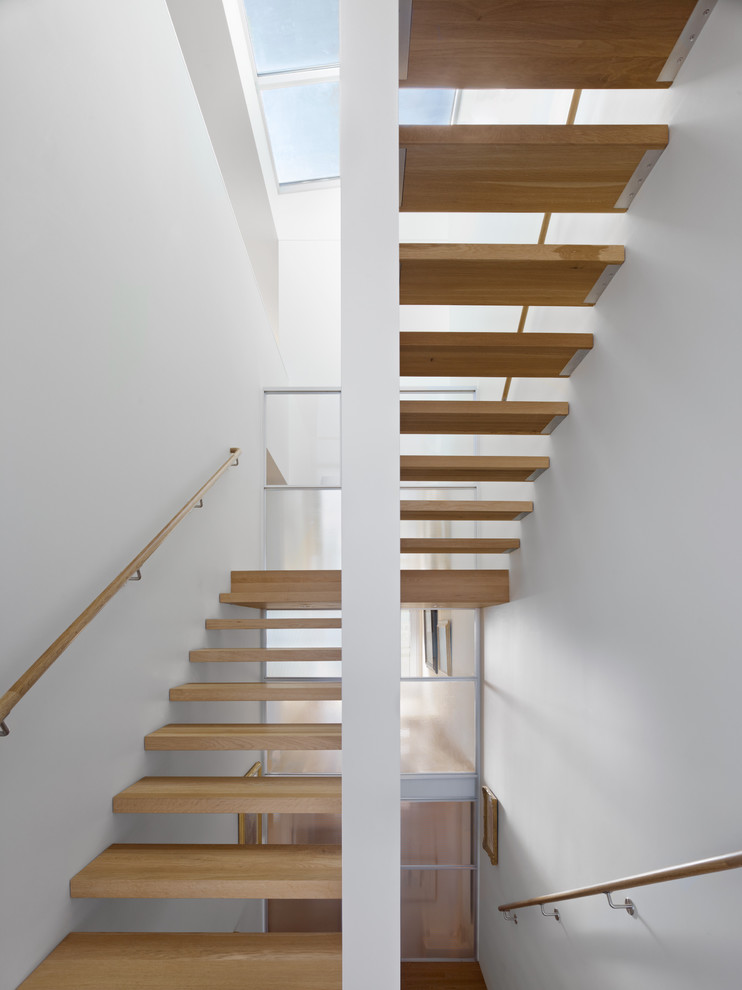 Inspiration for a contemporary floating staircase in San Francisco with open risers.