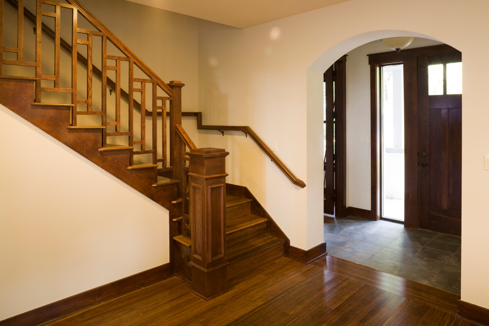 Inspiration for a mid-sized timeless wooden l-shaped staircase remodel in Austin with wooden risers
