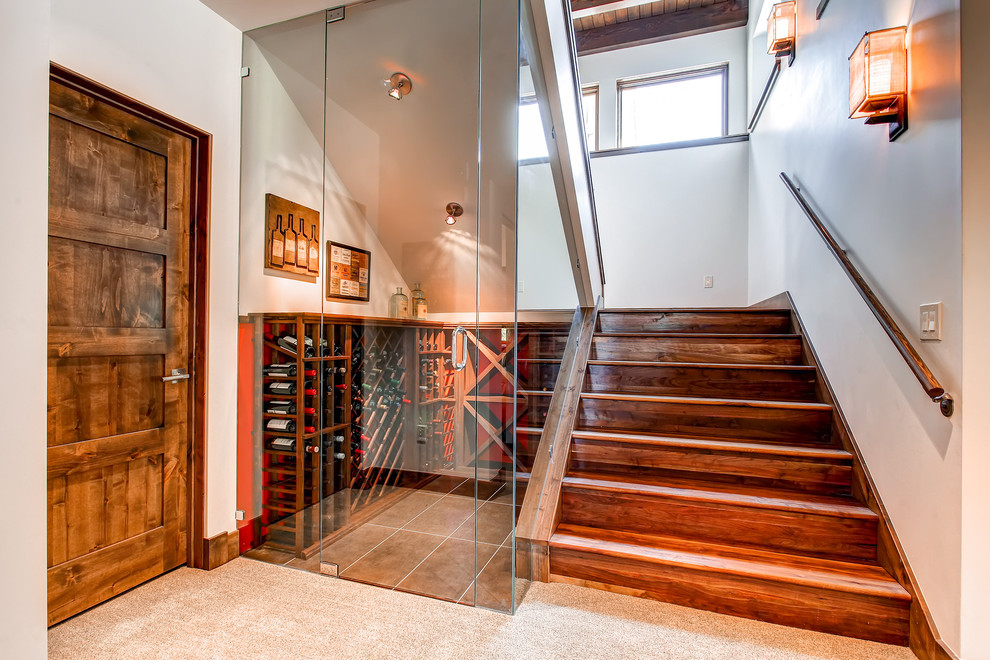 Inspiration for a contemporary wooden u-shaped staircase remodel in Denver with wooden risers
