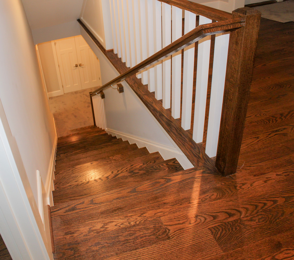 Large transitional wooden straight wood railing staircase photo in DC Metro with wooden risers