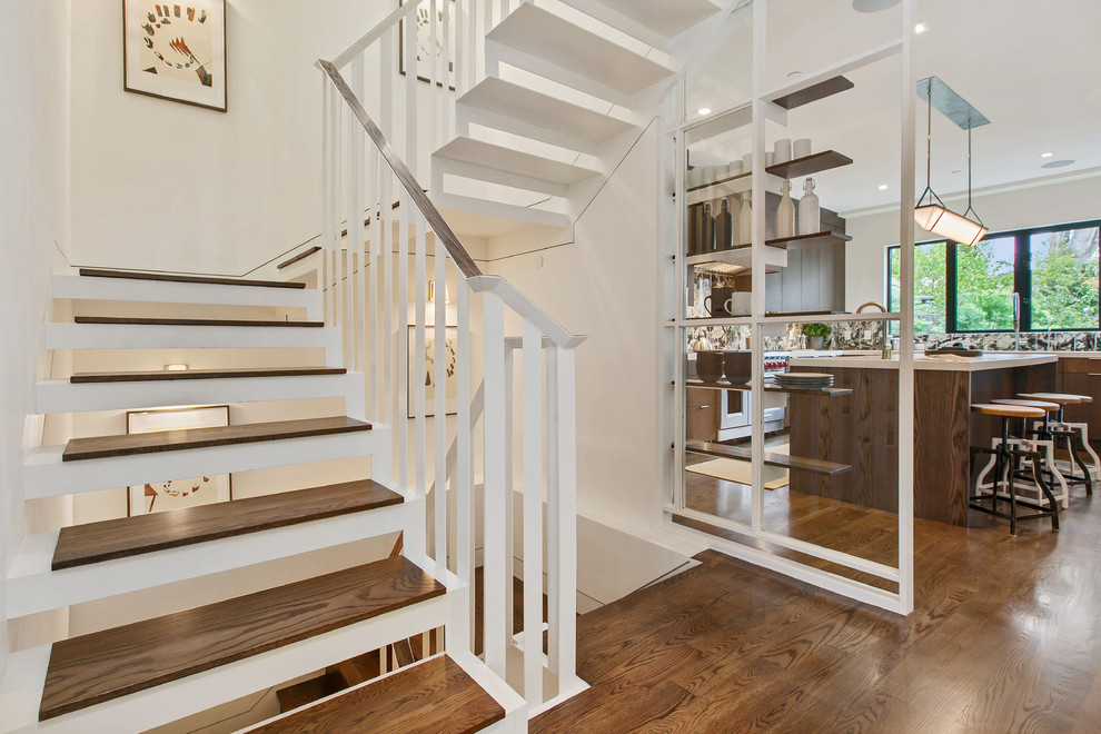 Идея дизайна: п-образная лестница среднего размера в стиле модернизм с деревянными ступенями без подступенок