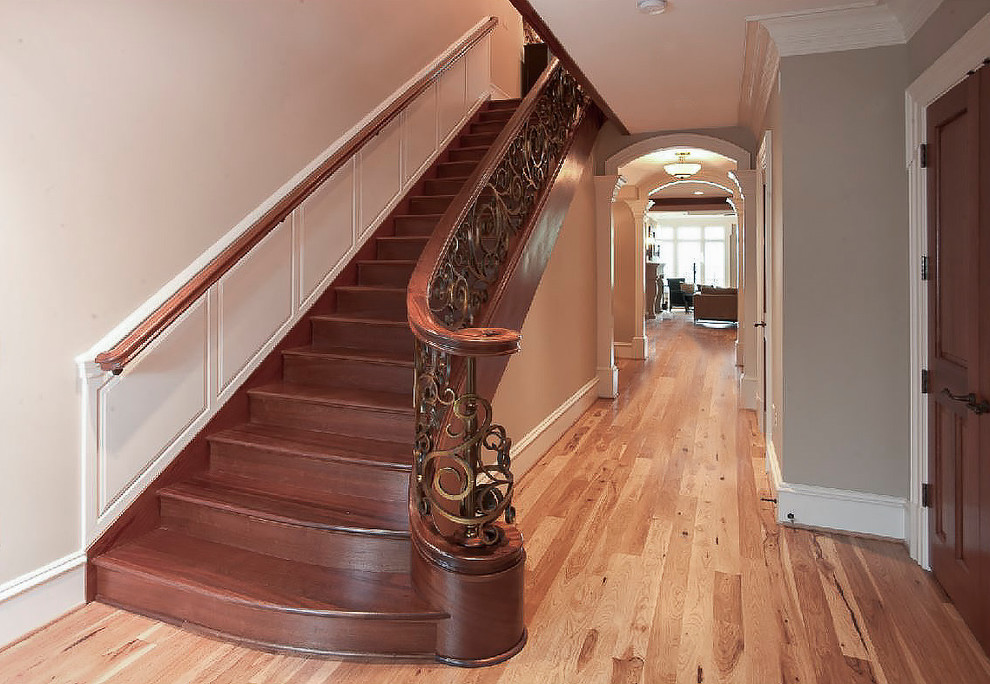 Staircase - huge mediterranean wooden floating mixed material railing staircase idea in DC Metro with wooden risers