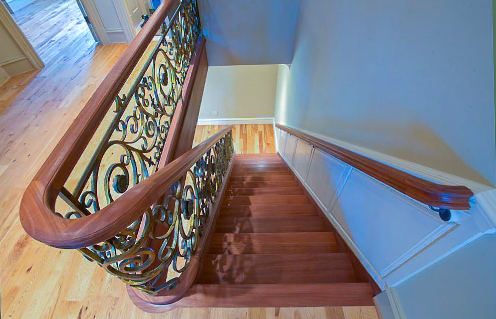 Design ideas for an expansive mediterranean wood floating mixed railing staircase in DC Metro with wood risers.