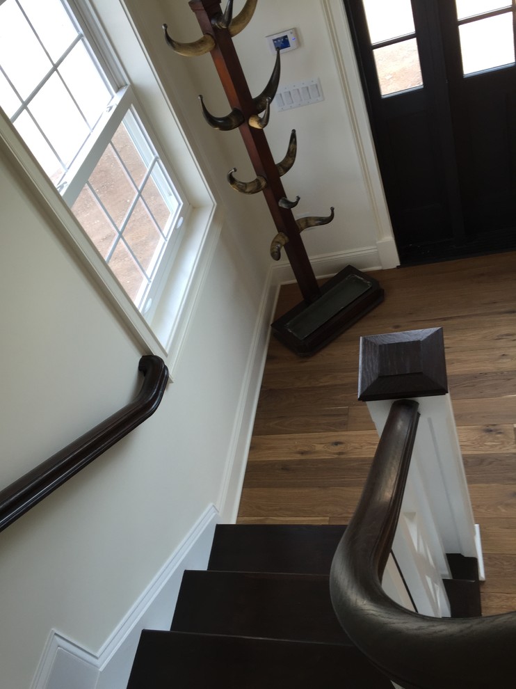 Staircase - small cottage wooden l-shaped wood railing staircase idea in DC Metro with wooden risers