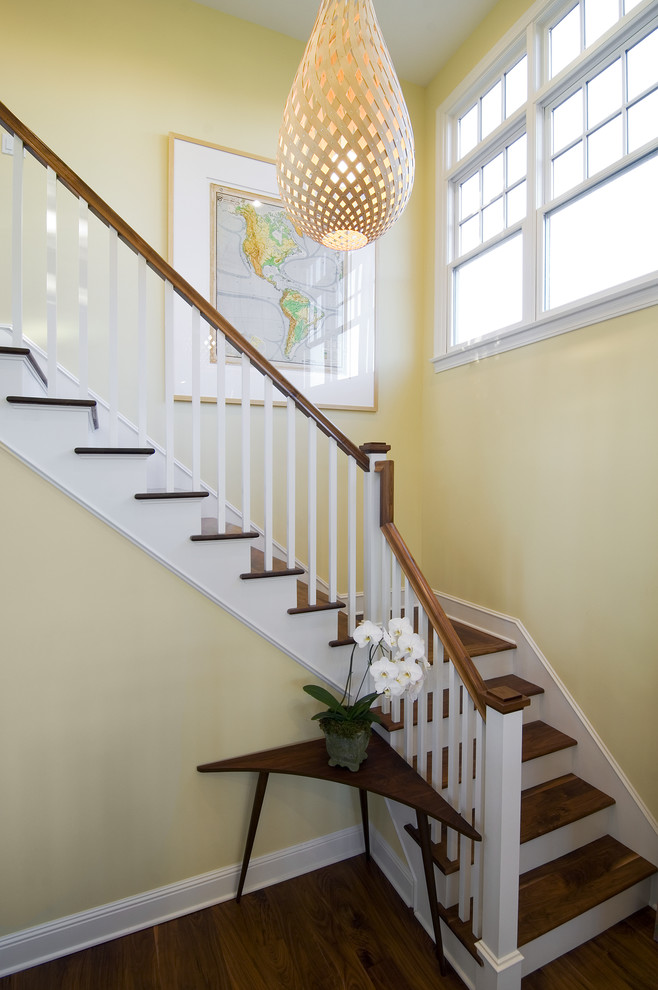 Inspiration for a mid-sized timeless wooden l-shaped staircase remodel in Los Angeles with wooden risers