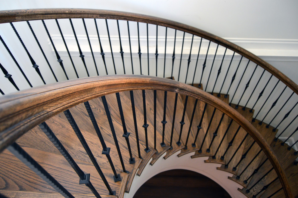 Inspiration for a huge eclectic wooden floating mixed material railing staircase remodel in DC Metro with wooden risers