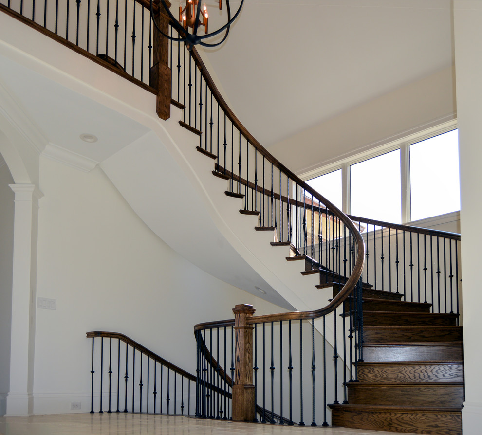 Huge eclectic wooden floating mixed material railing staircase photo in DC Metro with wooden risers
