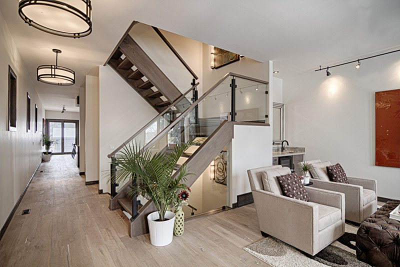Staircase - large transitional wooden u-shaped open staircase idea in Calgary