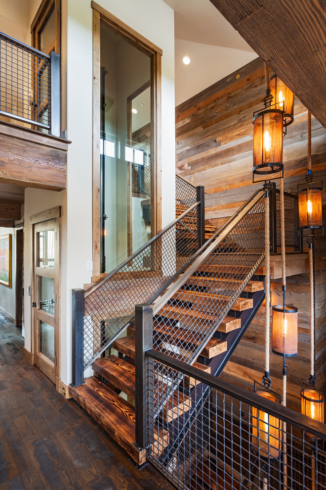 Design ideas for a rustic wood l-shaped staircase in Denver.