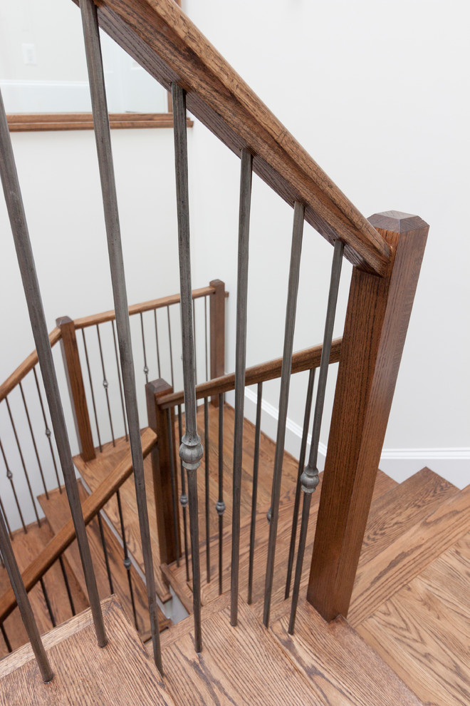 Foto de escalera suspendida contemporánea extra grande con escalones de madera, contrahuellas de madera y barandilla de vidrio
