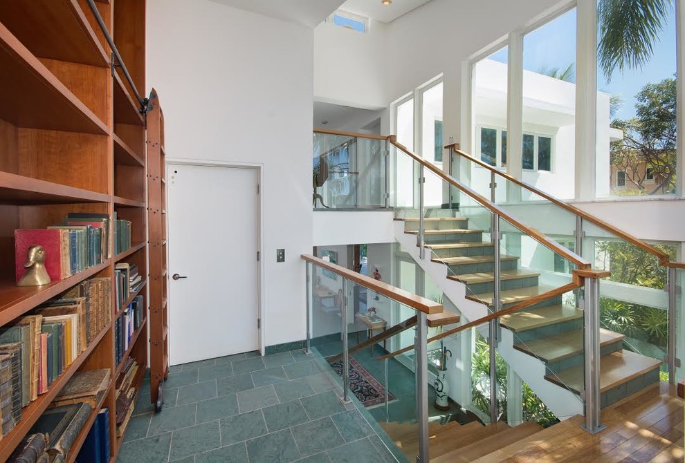 Staircase - modern wooden u-shaped staircase idea in Miami